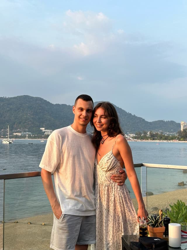 Couple by the water, another angle